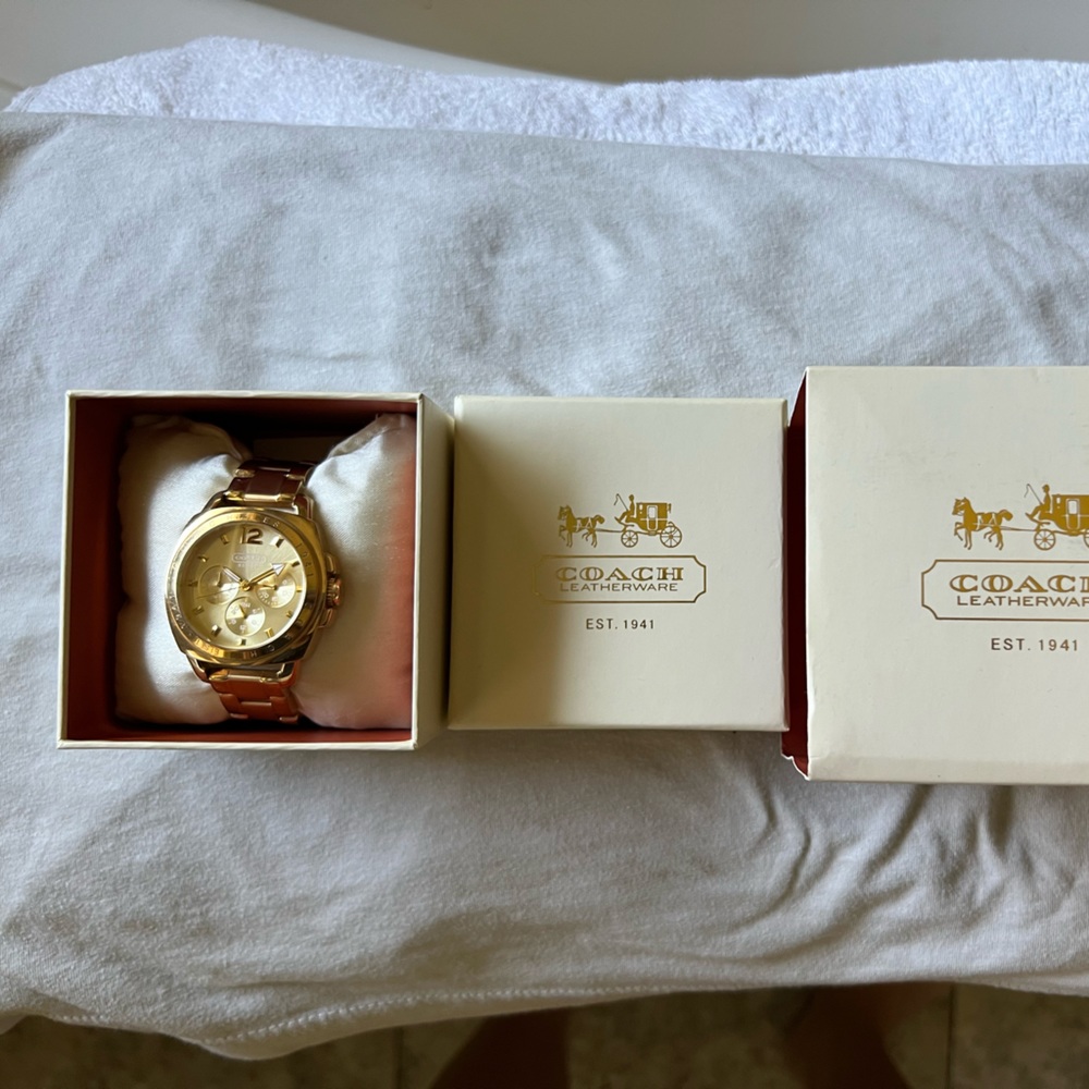 Gold Coach Woman’s Watch. New battery needed.